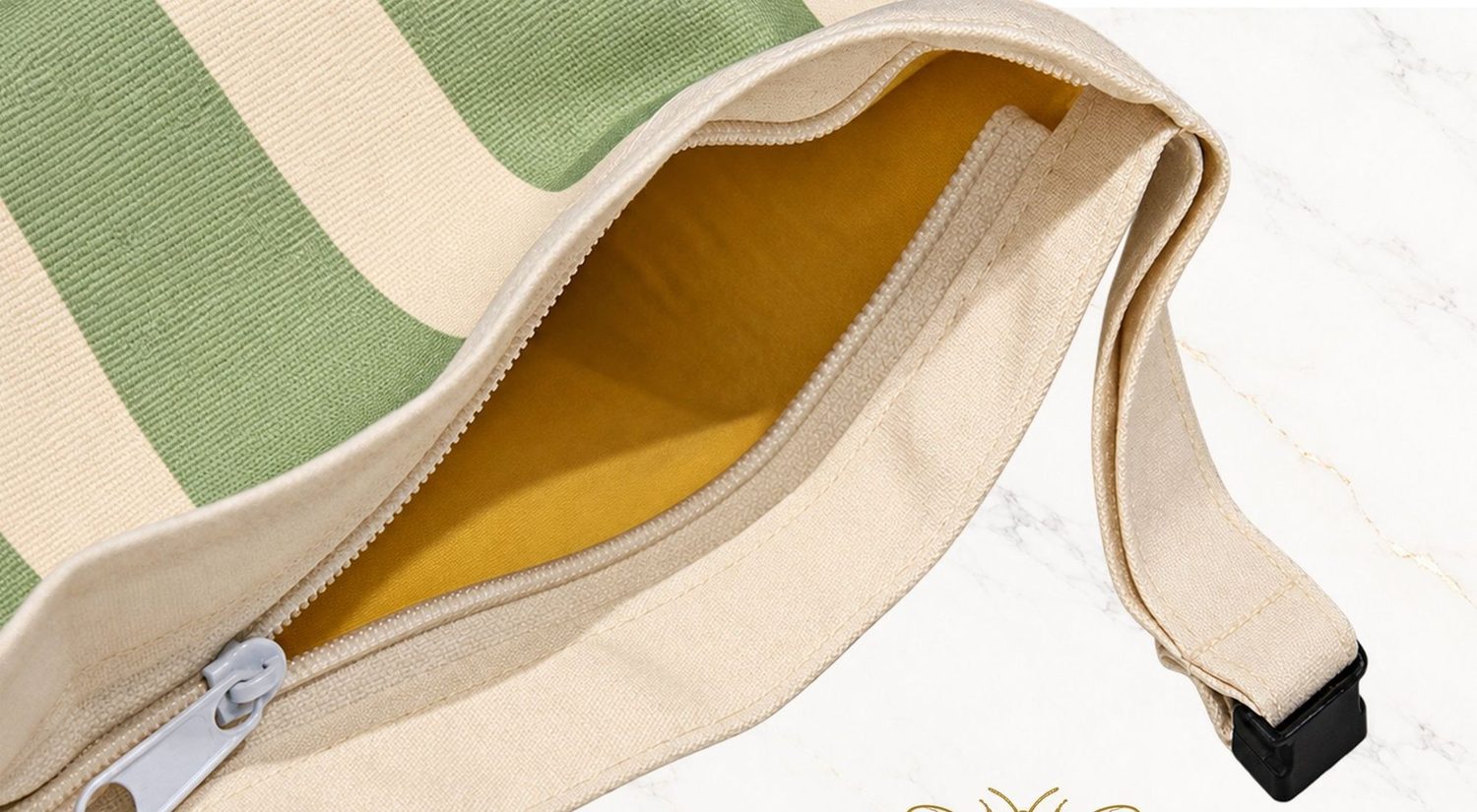 The open zip of a Melipsa bread bag, showing the golden beeswax lining inside